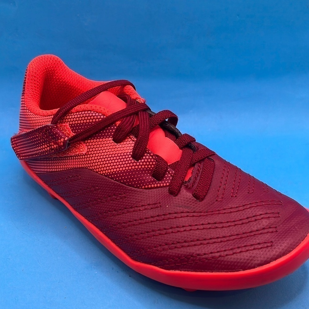 Ground soccer cleats burgundy/orange - kids
Size 12.5c